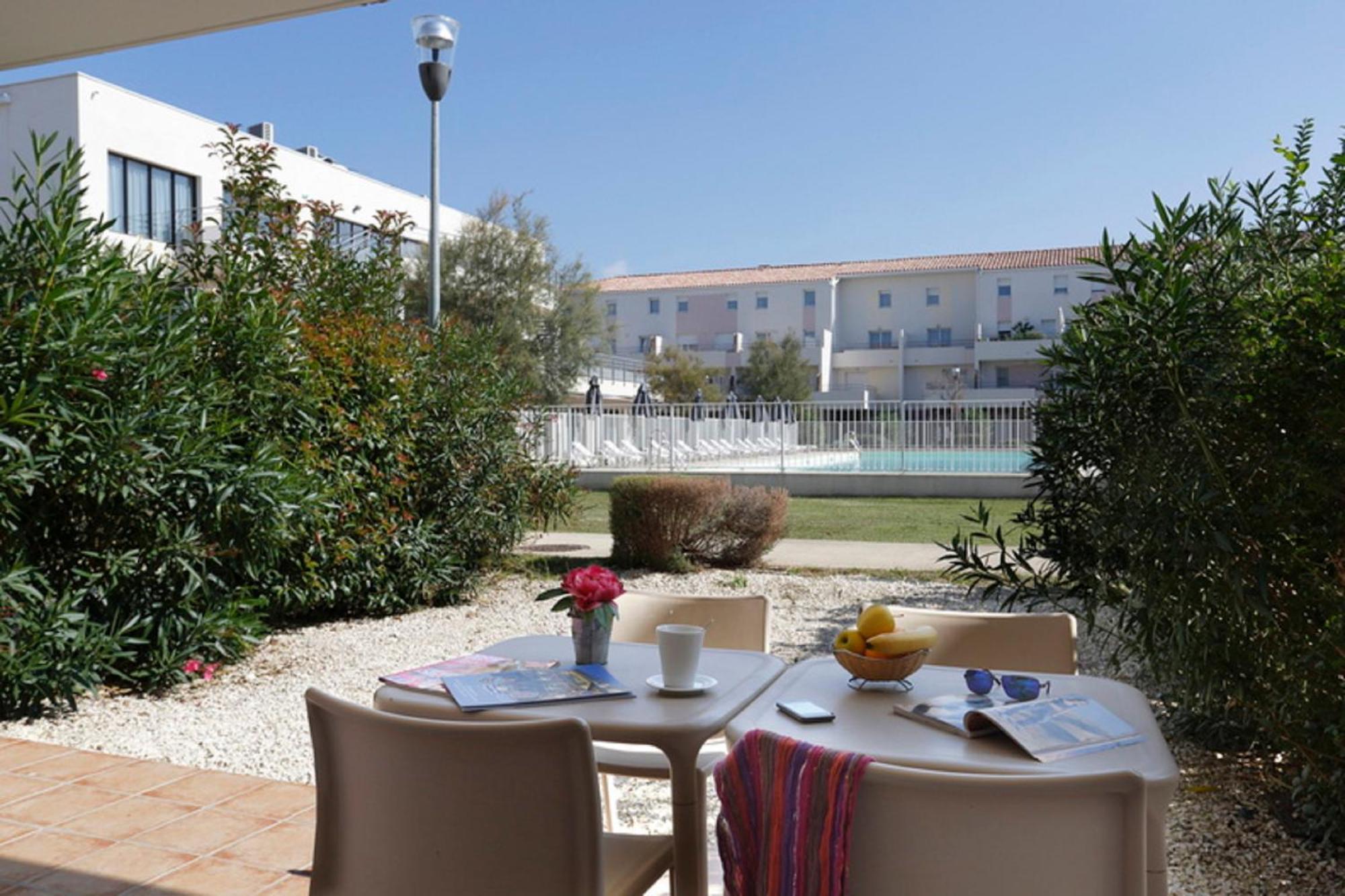 Vacanceole - Residence Cap Camargue Льо Гро-дю-Роа Екстериор снимка